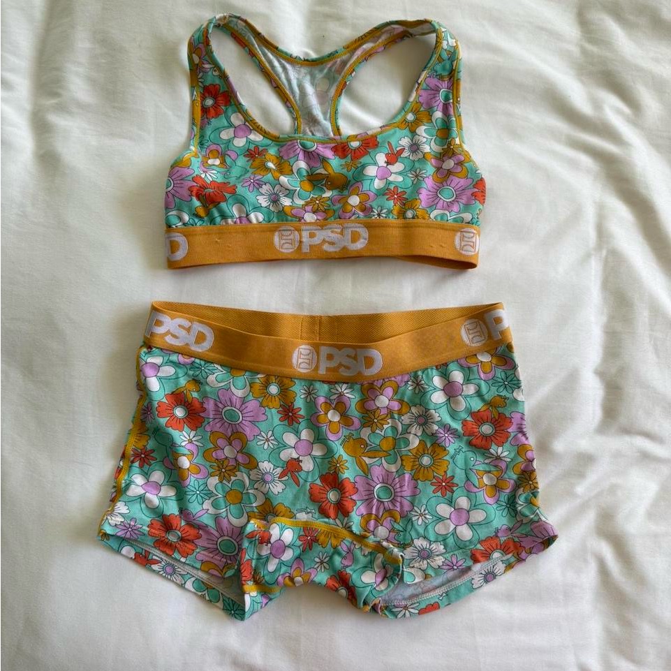 Psd Vibrant Floral Sports Set With Orange Accents